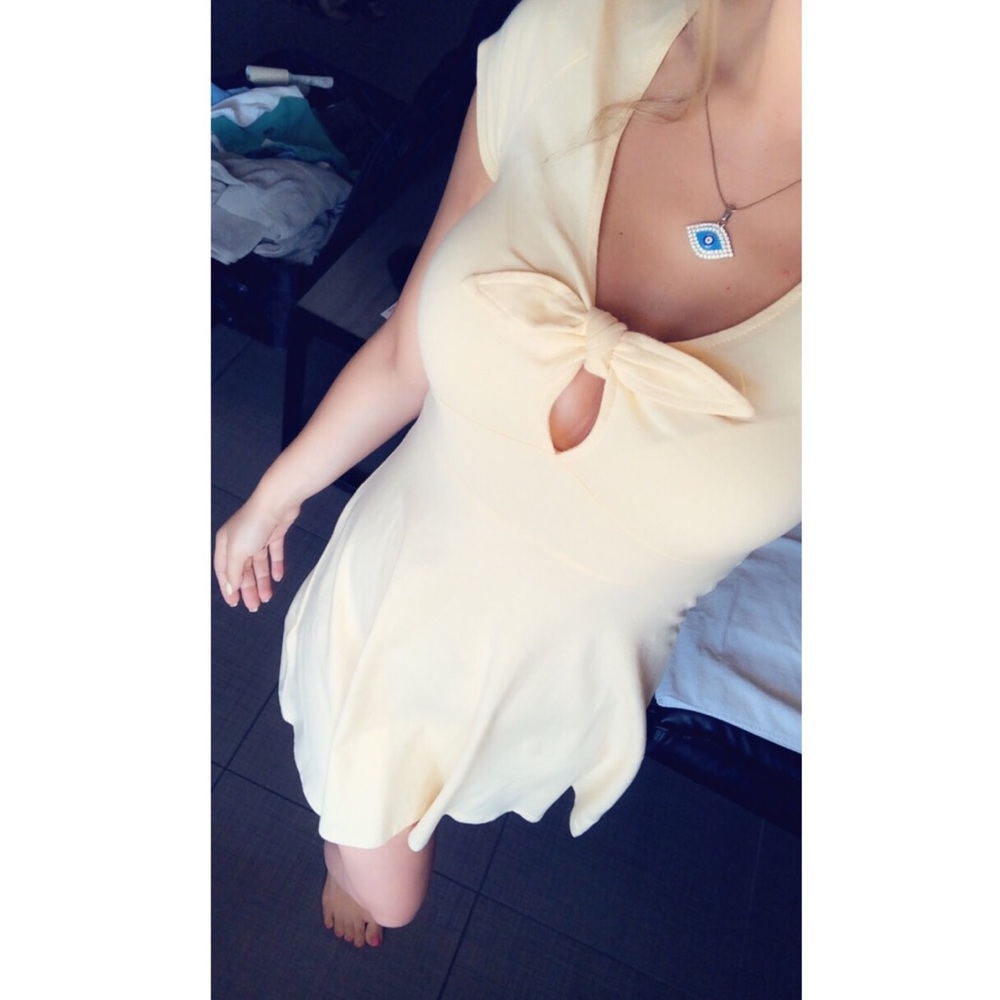 Yellow tie flare dress